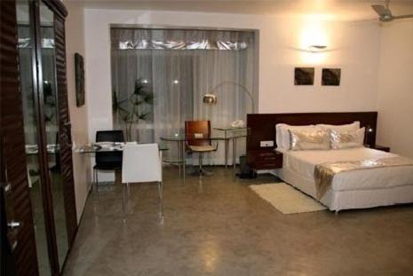 Purple Lotus Aparthotel Μπανγκαλόρ Δωμάτιο φωτογραφία